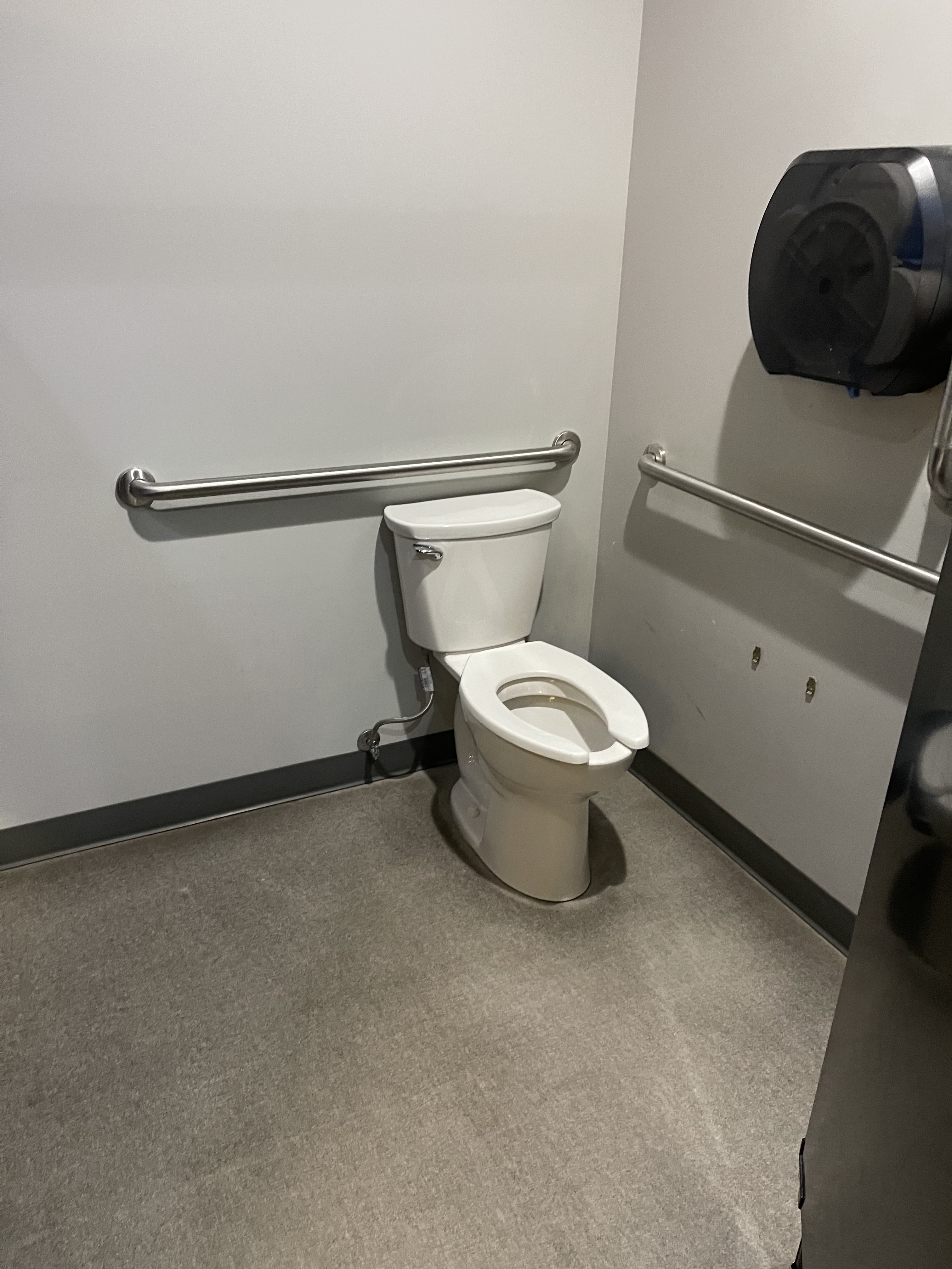 Toilet with transfer bars on right