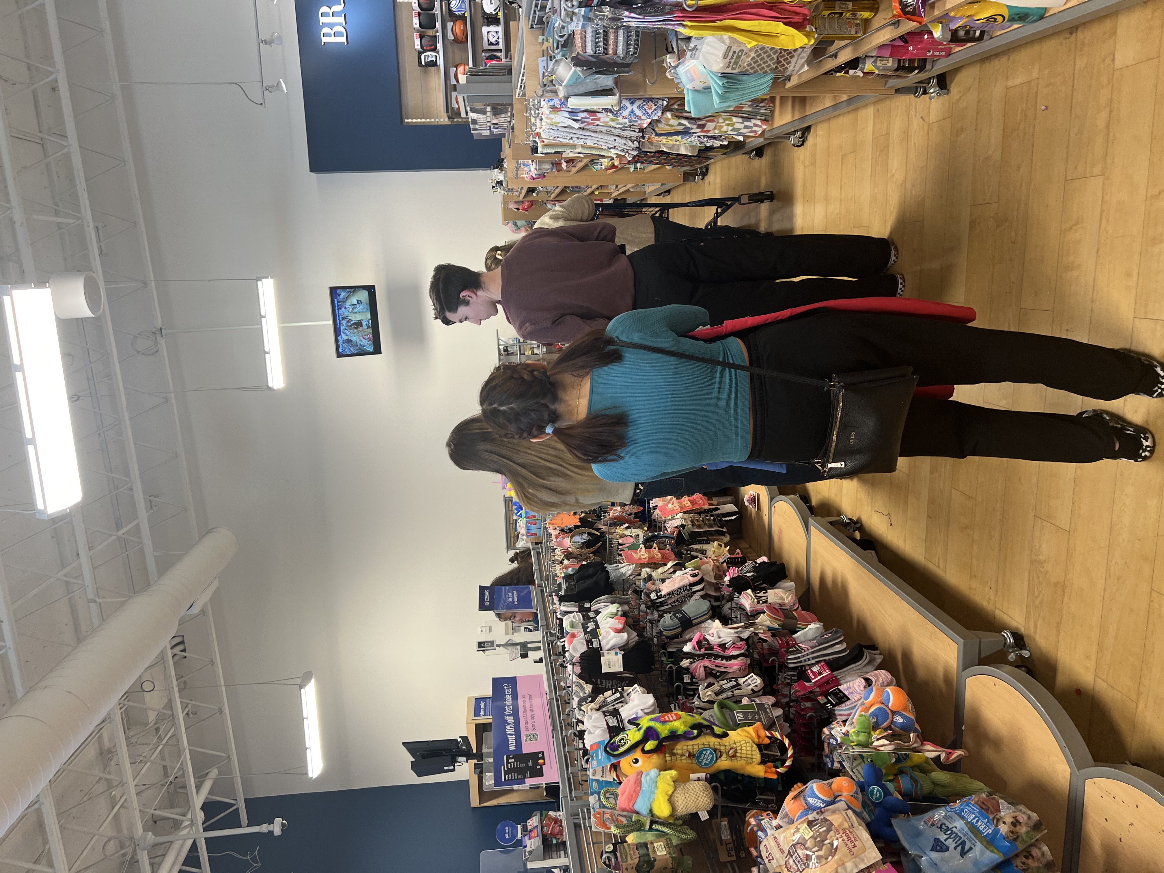 View of the aisle from checkout line.