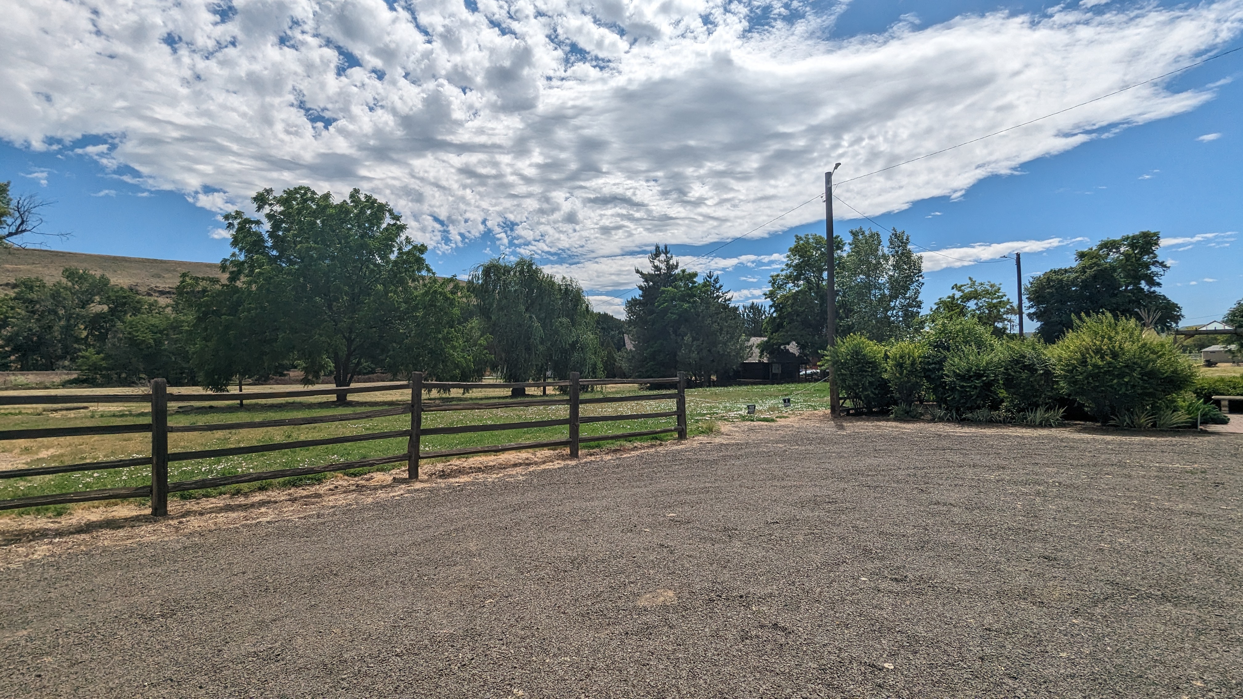 Back gravel lot with no designated spaces