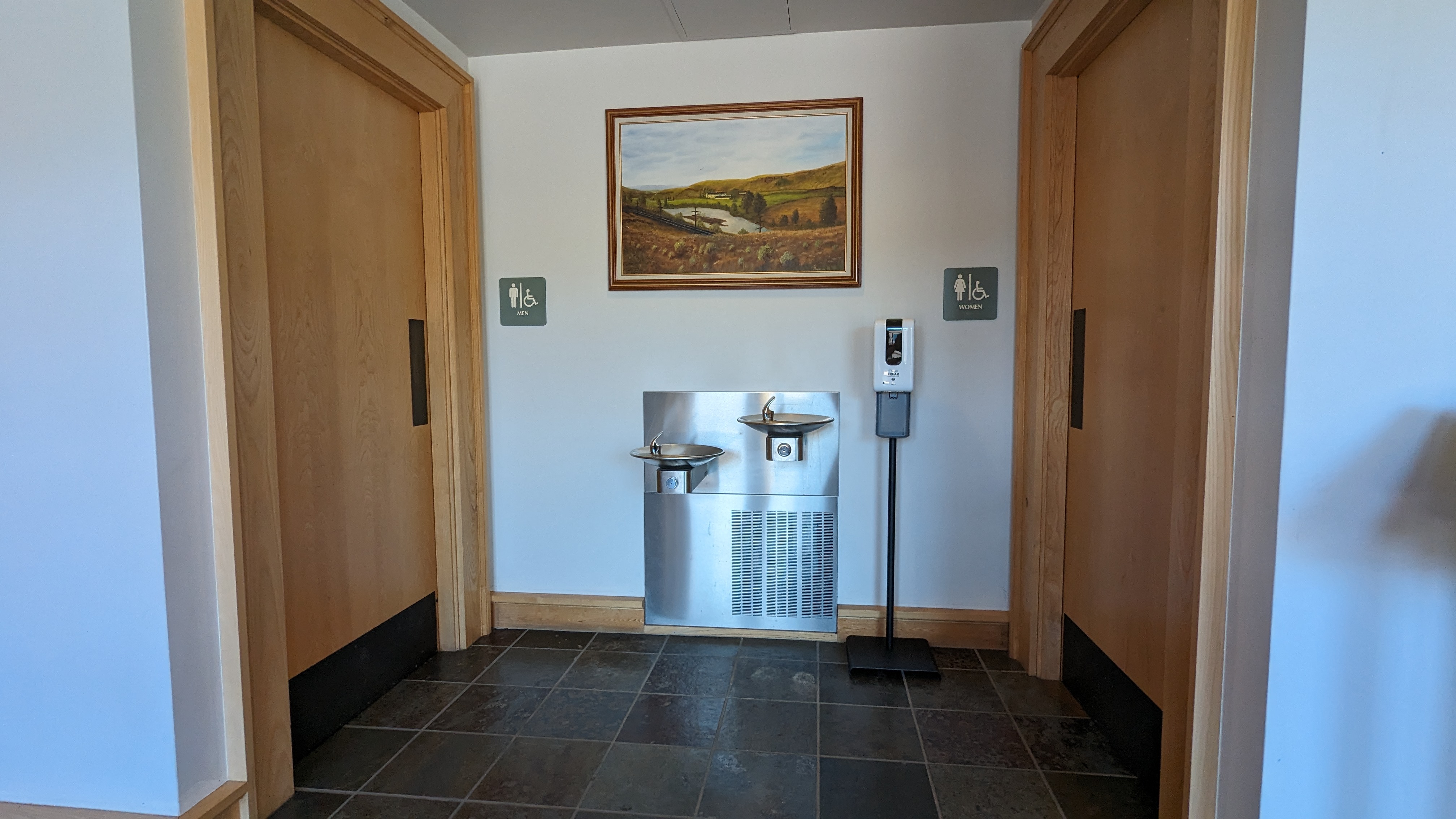 Drinking fountain and entrance to restrooms.
