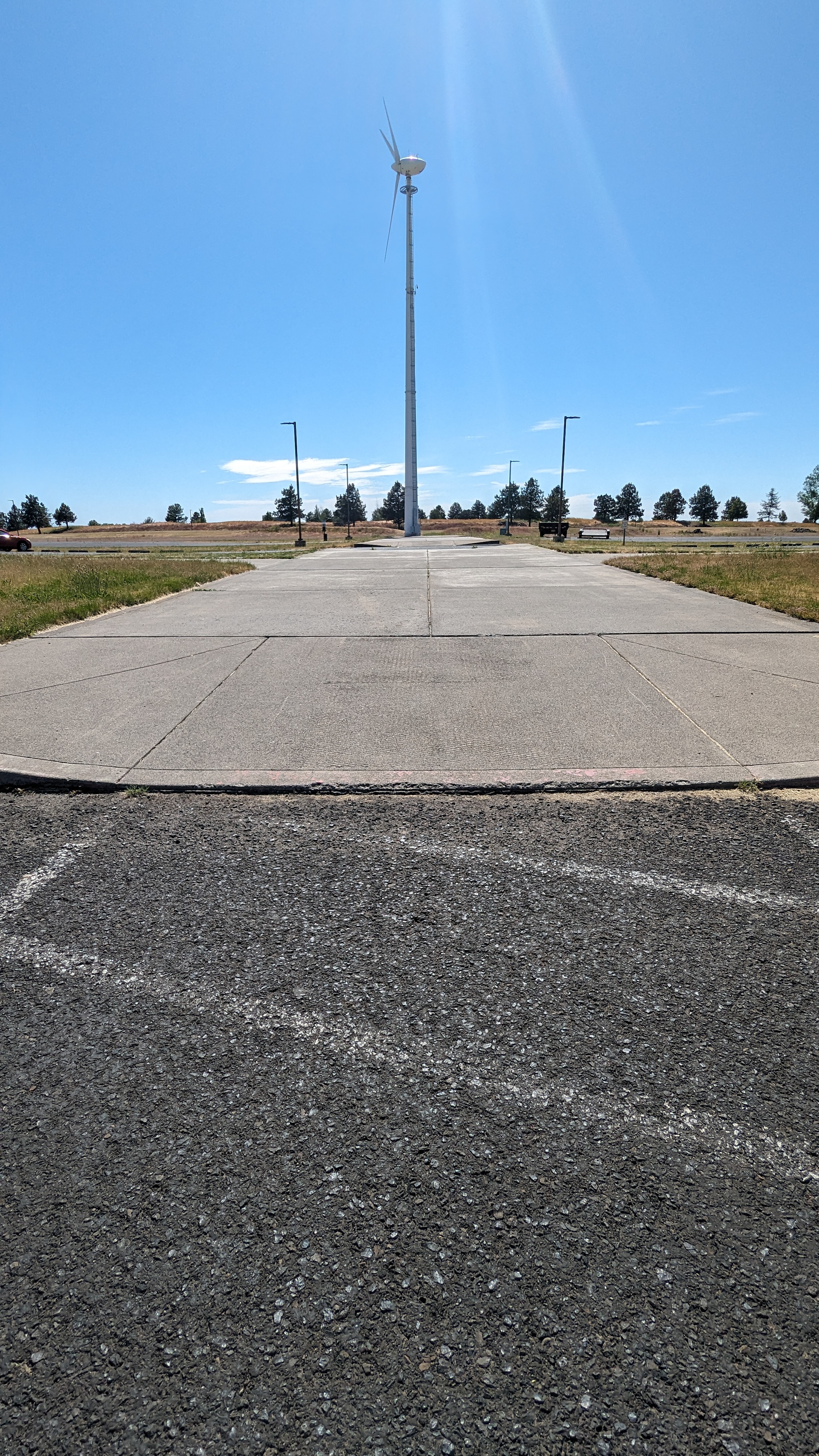 Curb-cut to parking with difficult transition.