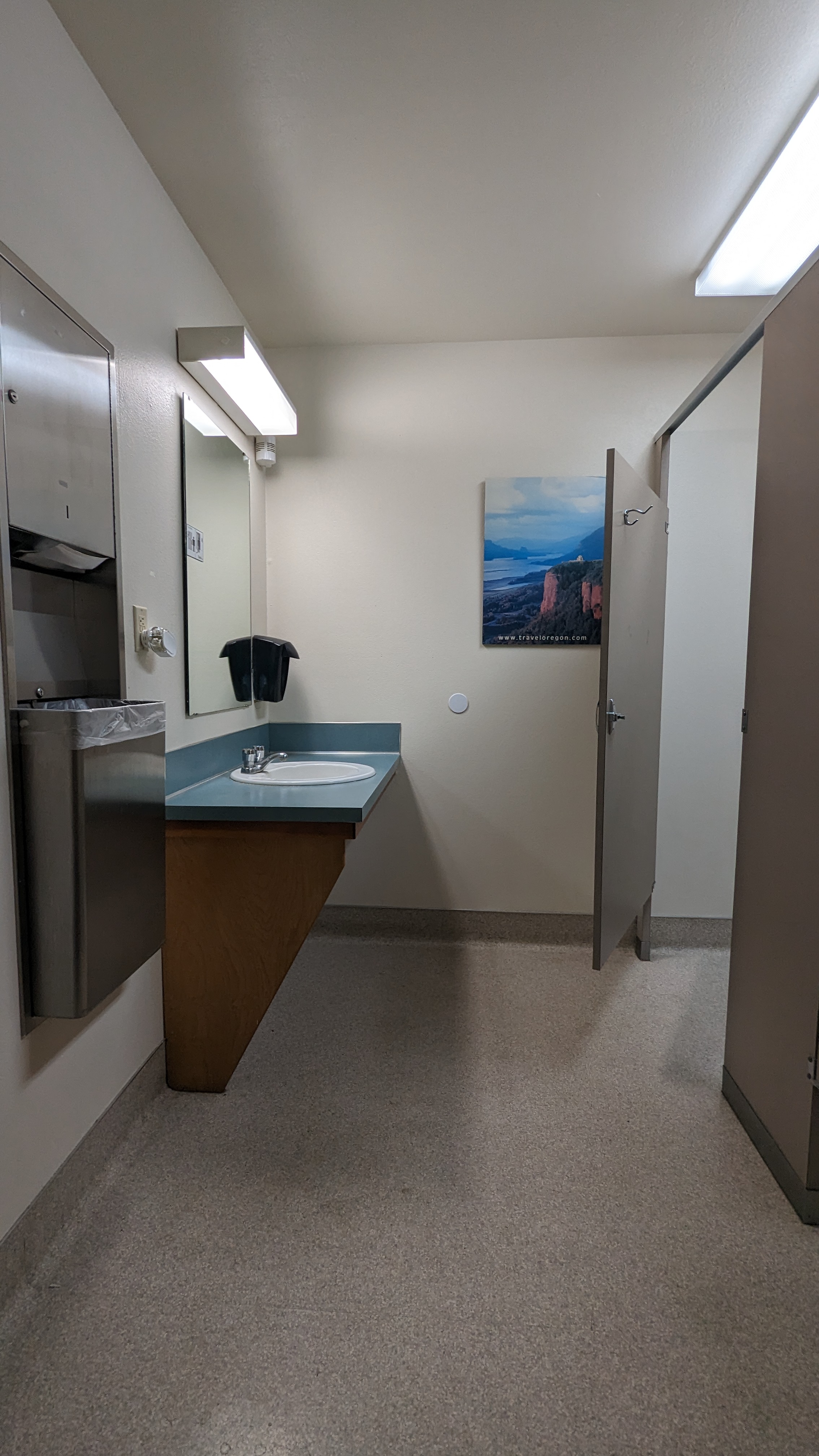 Restroom sink and stalls.