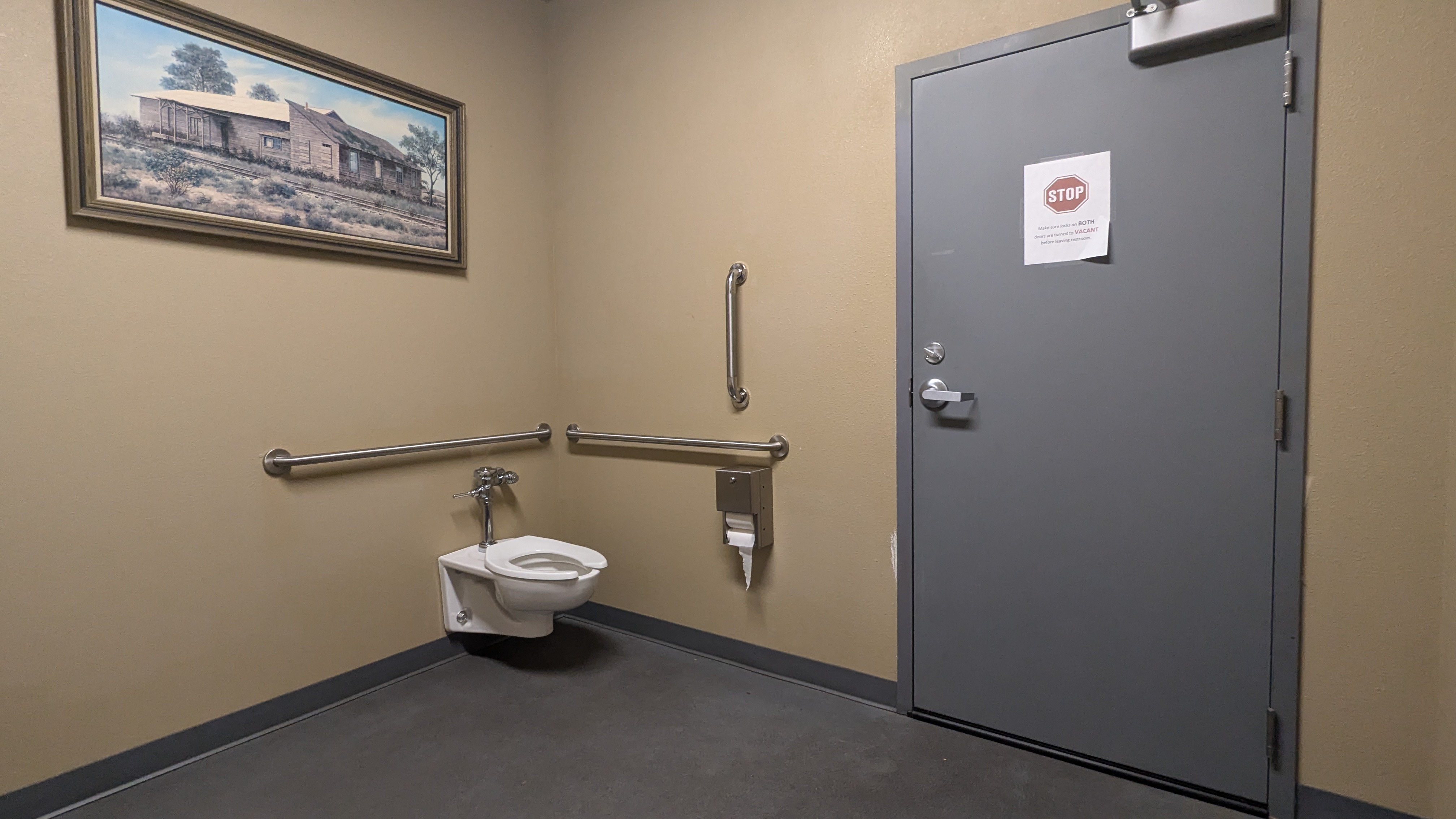 Large single room, all gender restroom.