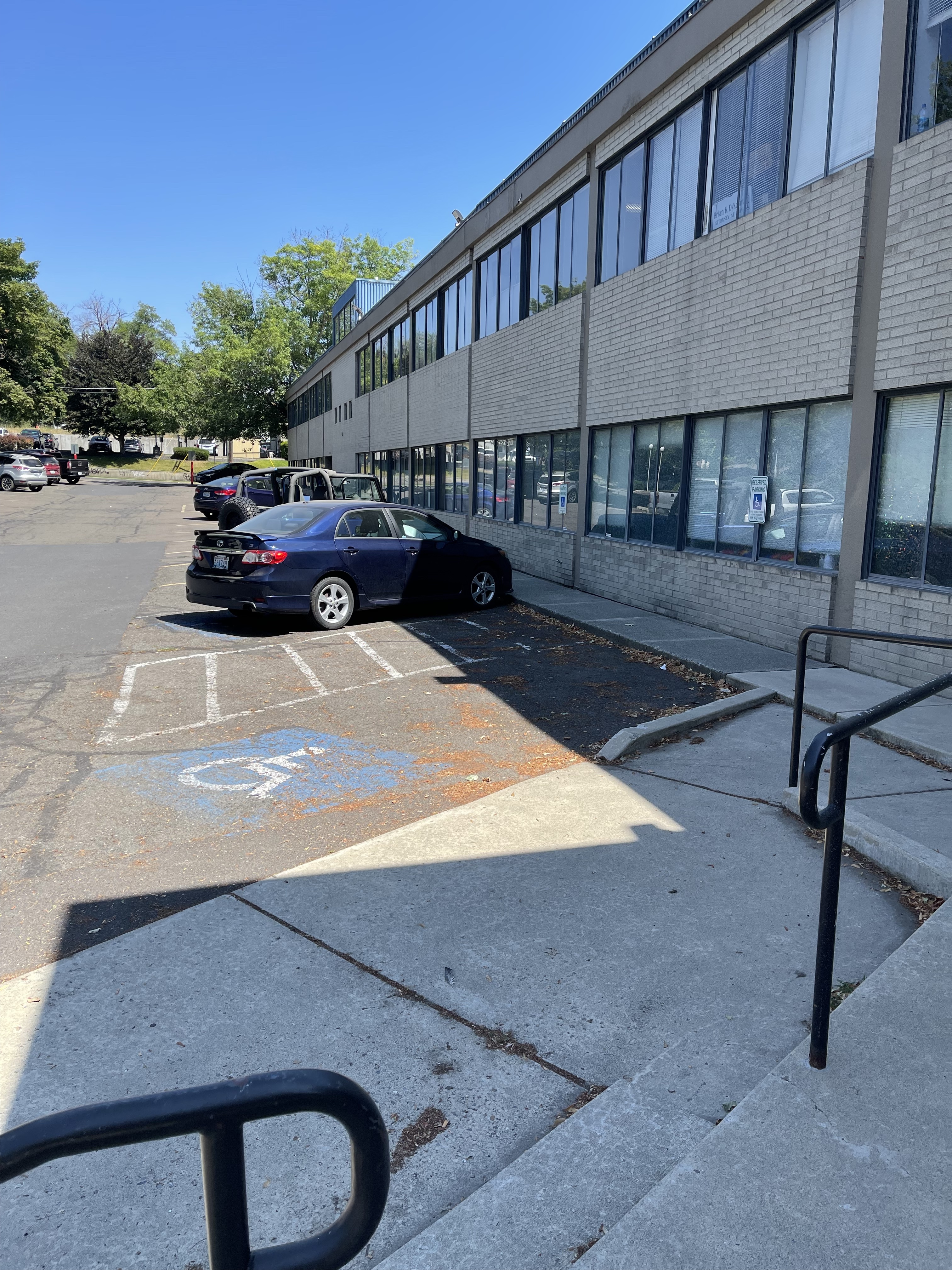 Accessible space in back lot