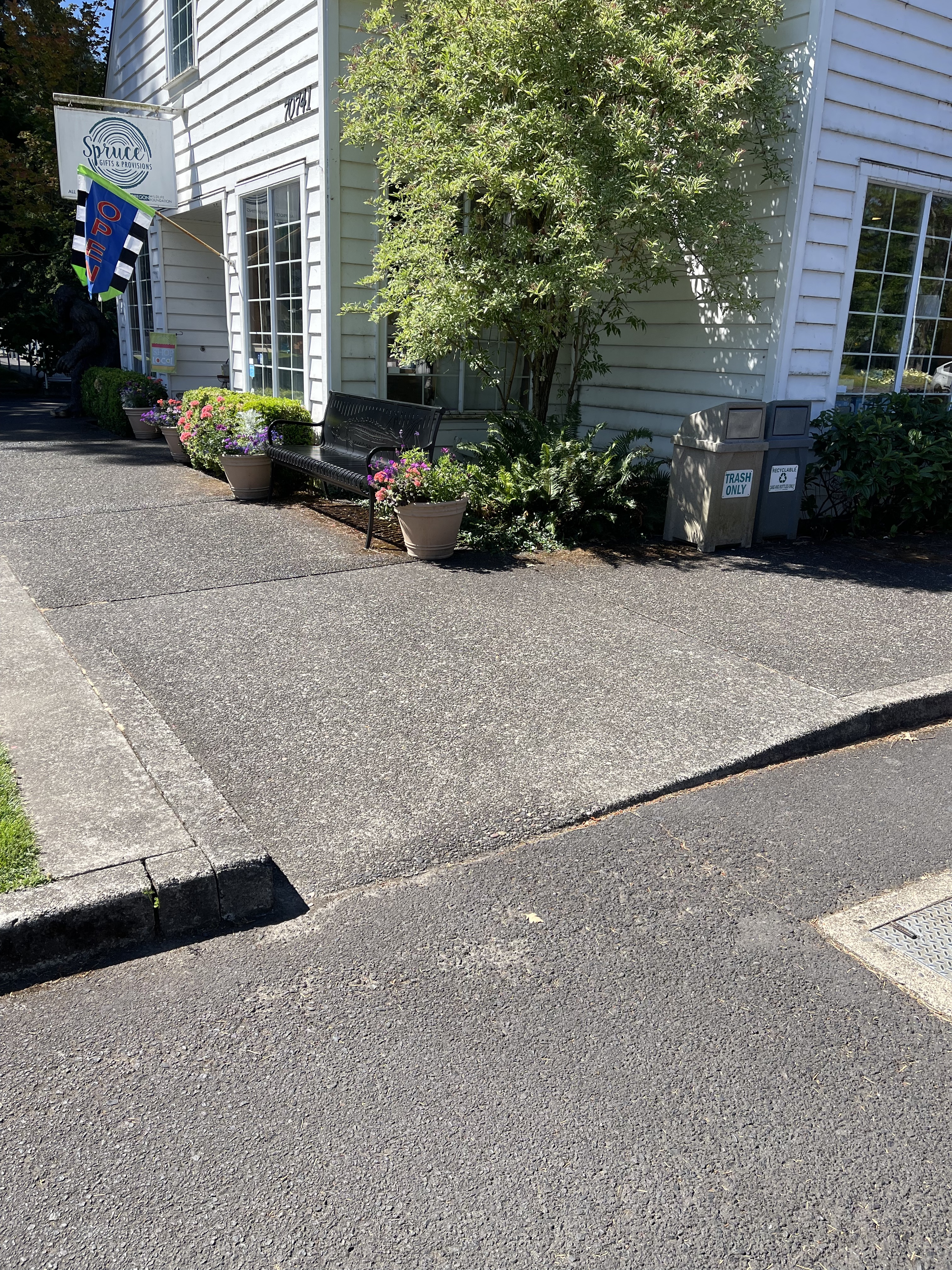 Curb cut from parking lot to gift shop