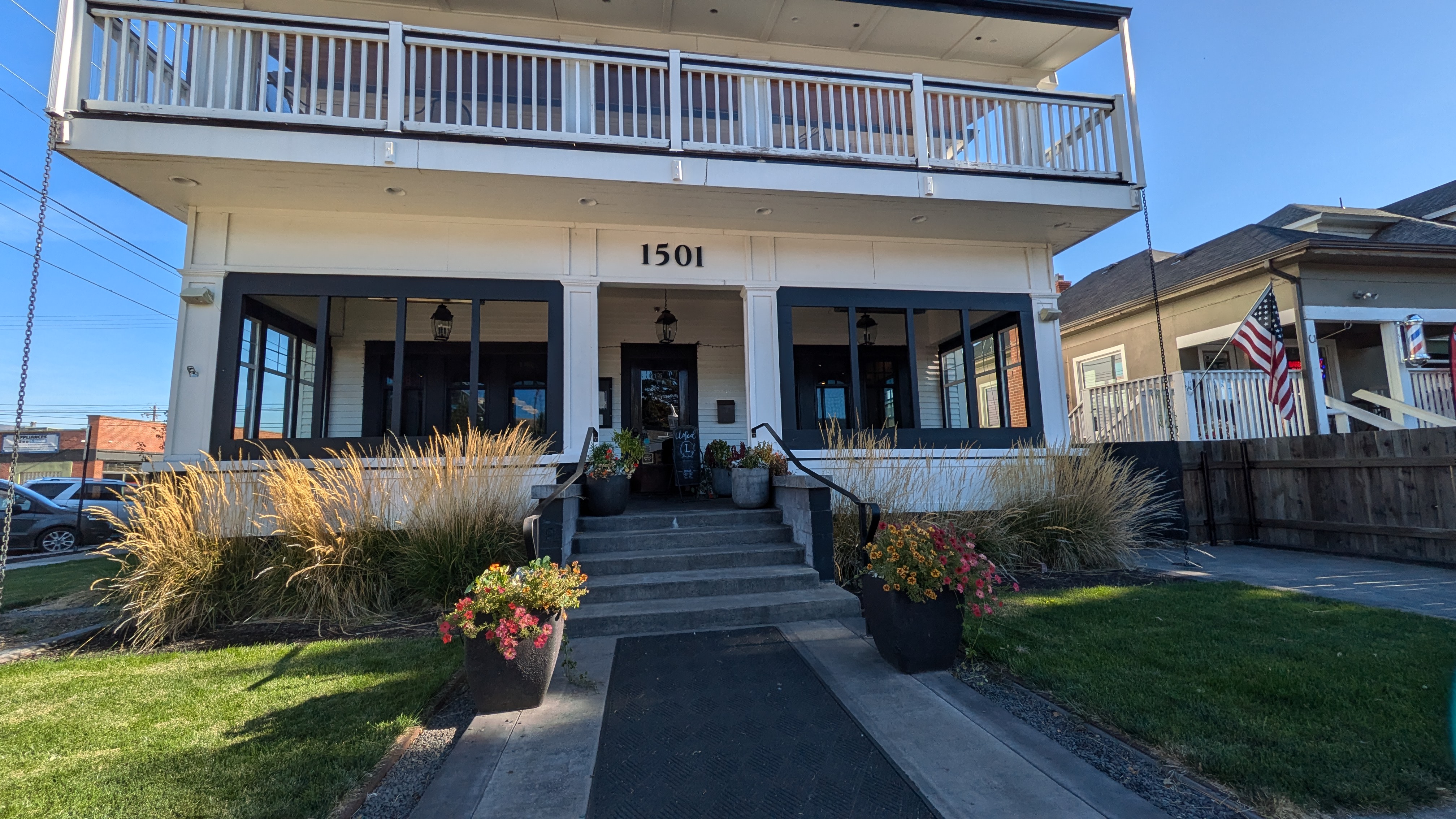 Front of building, stairs only. Ramp in back.