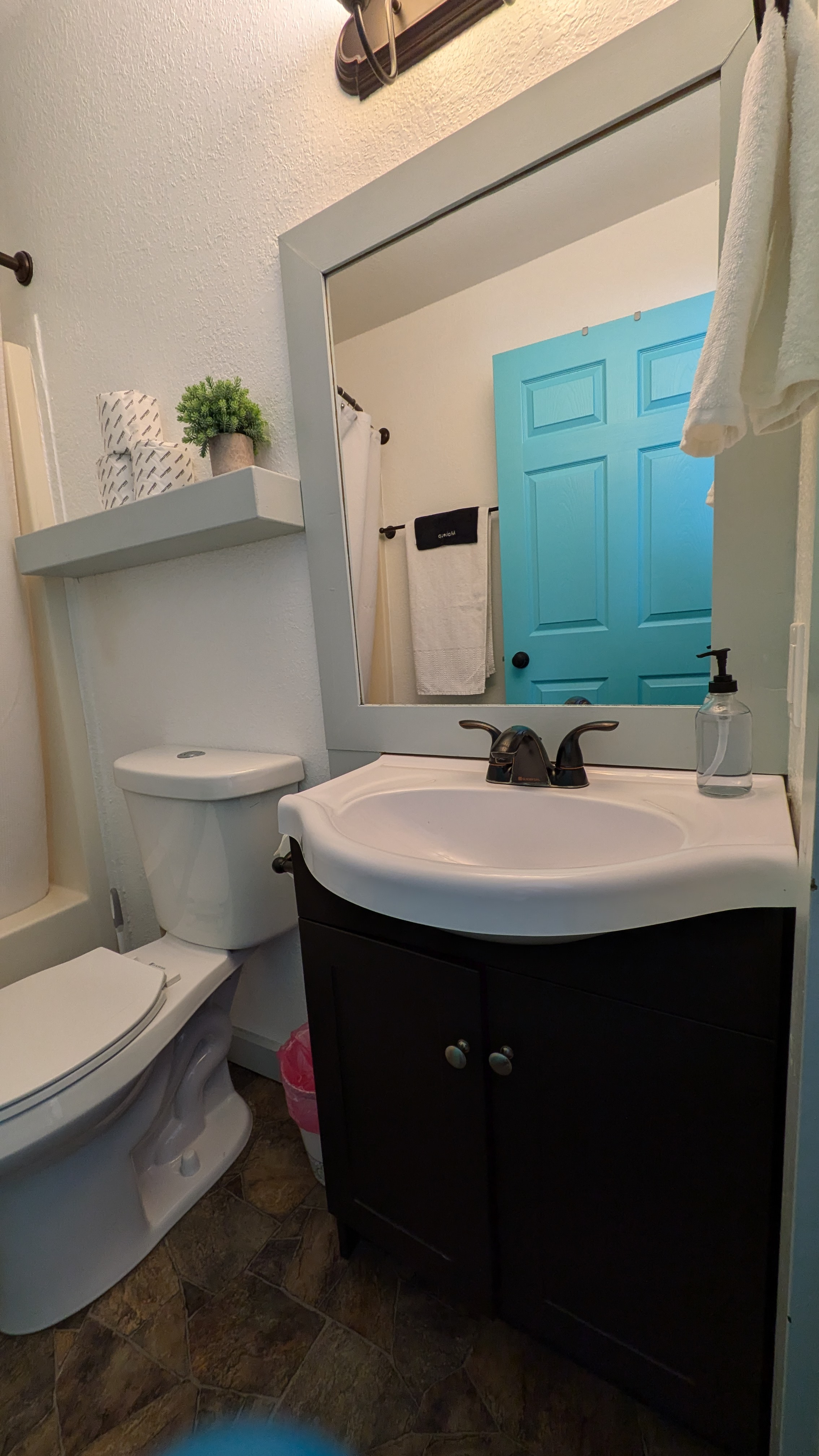 restroom with shower