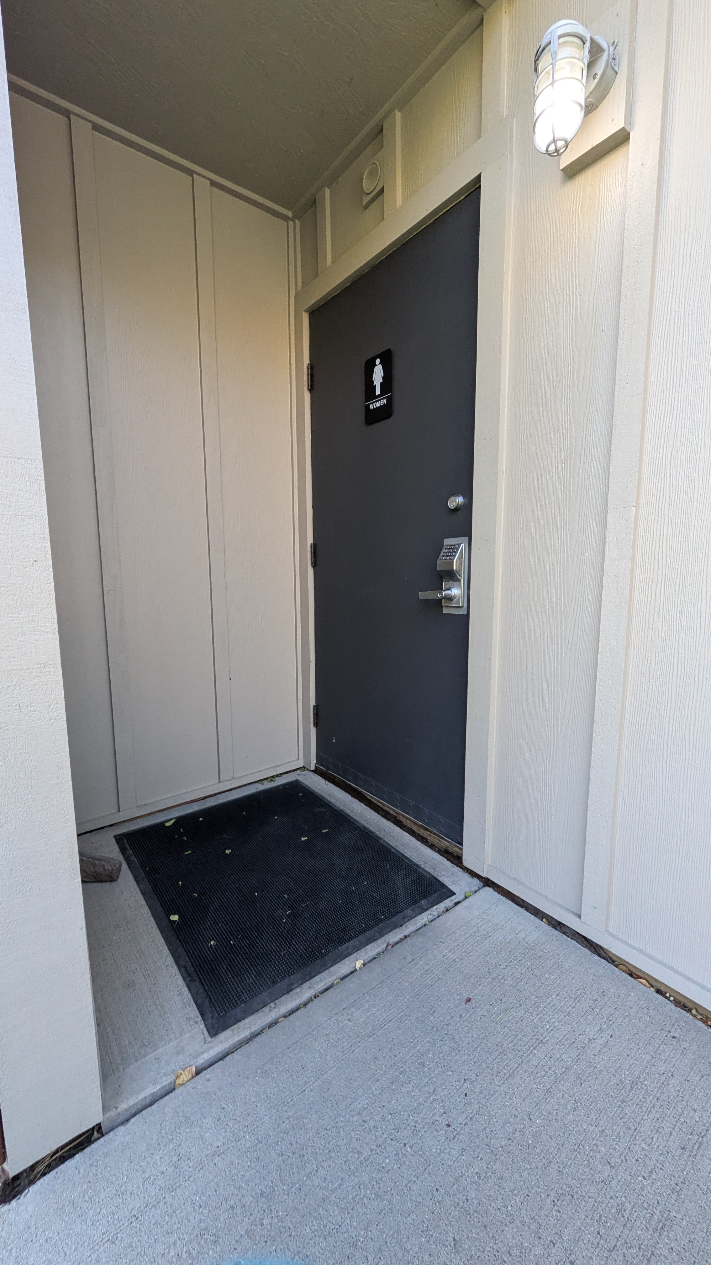 women's restroom entrance with lip