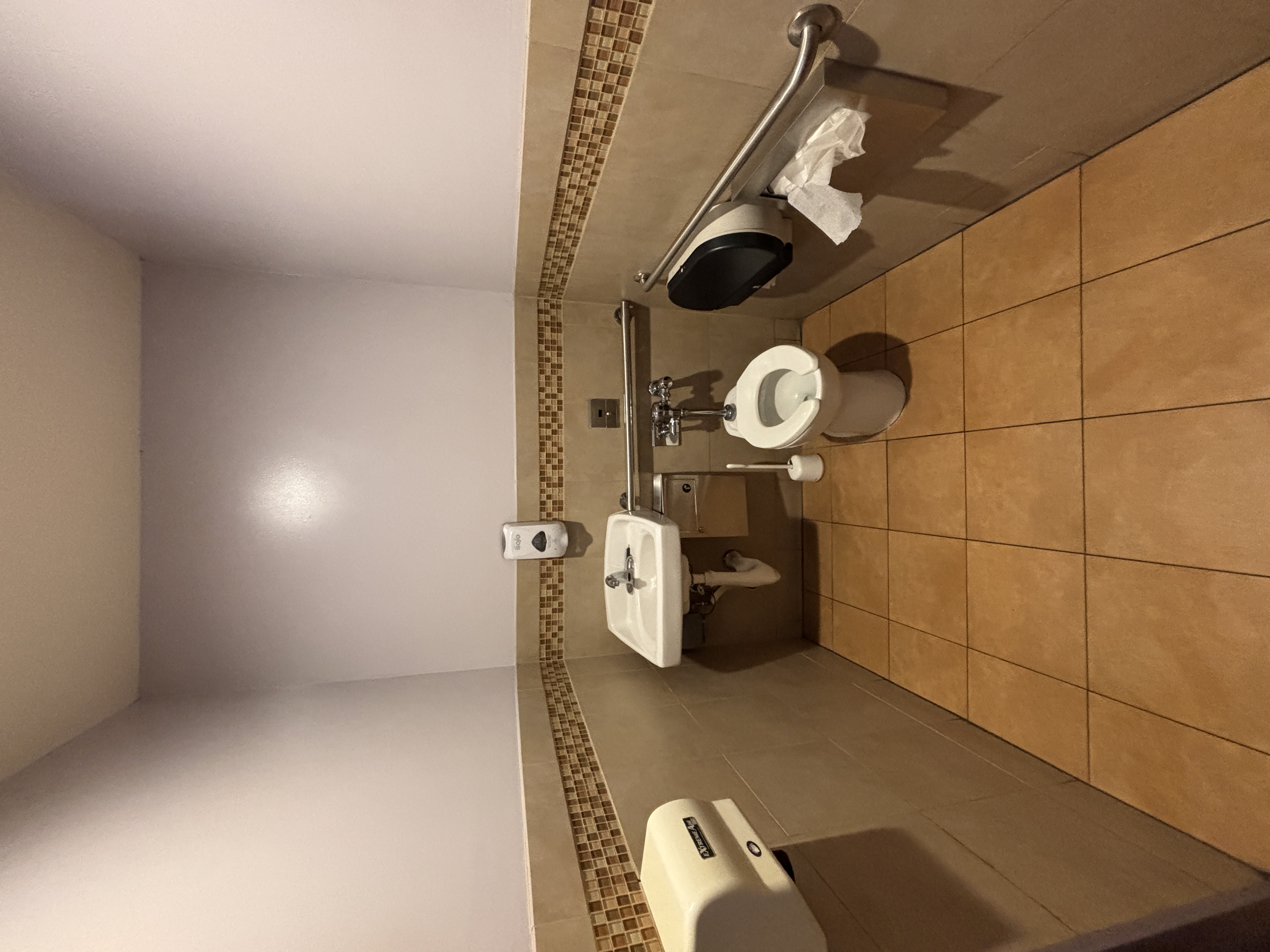 Womens accessible stall with changing table.