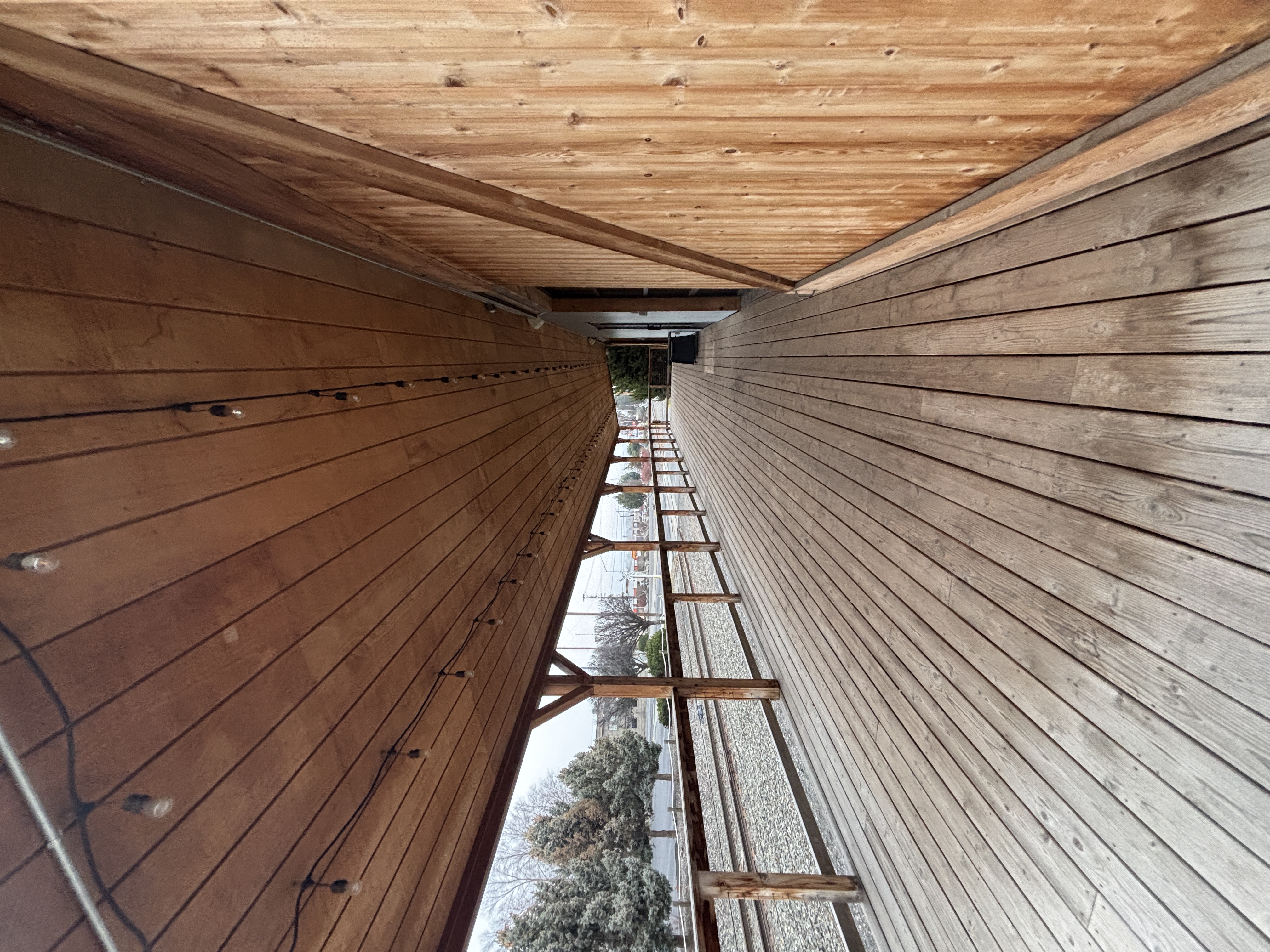 Back covered patio with exterior and interior access.