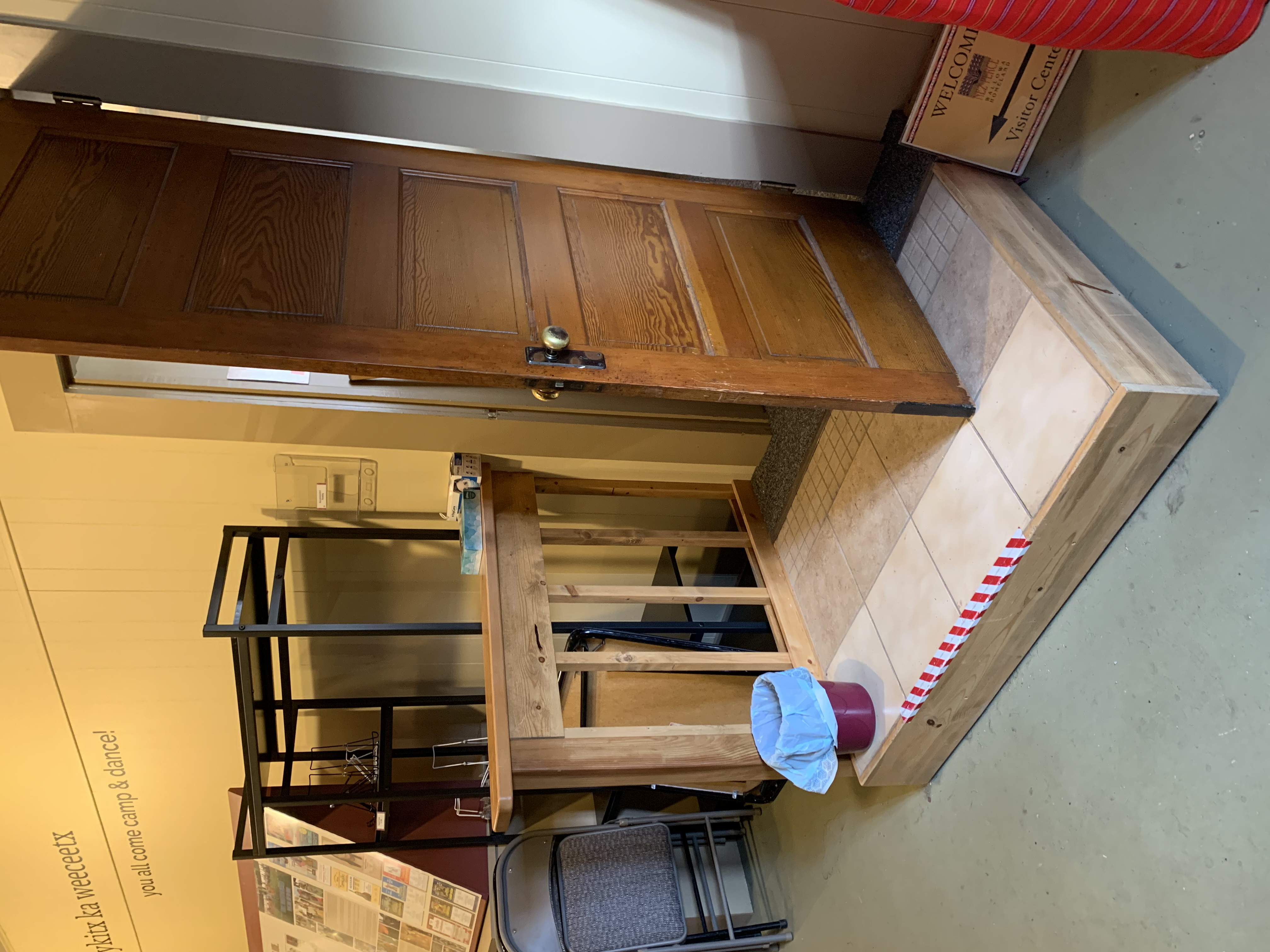 The visitor center has a second exit with a step, which leads to the entryway and the staff offices.