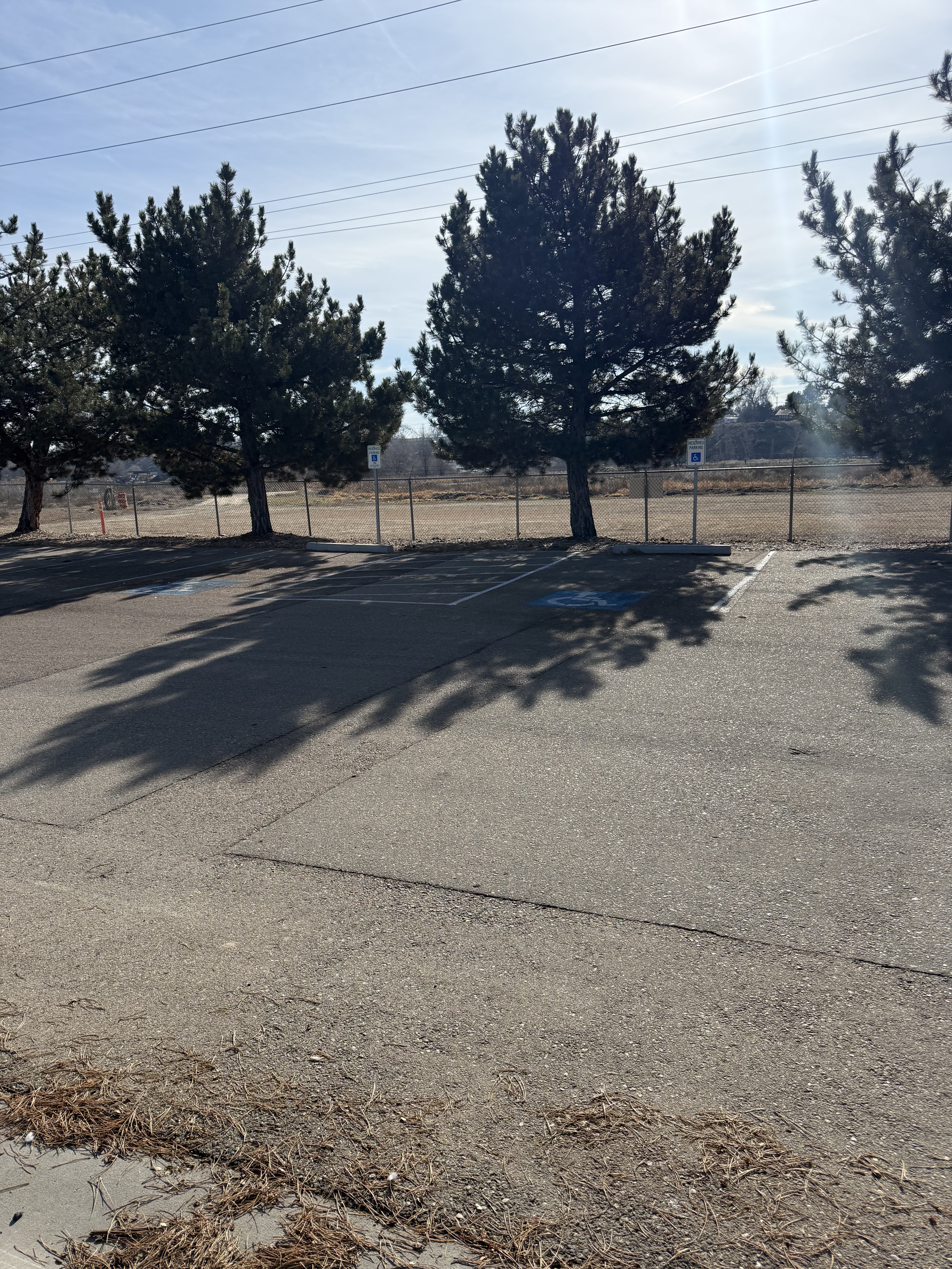 2 van accessible parking spaces across from pathway to building