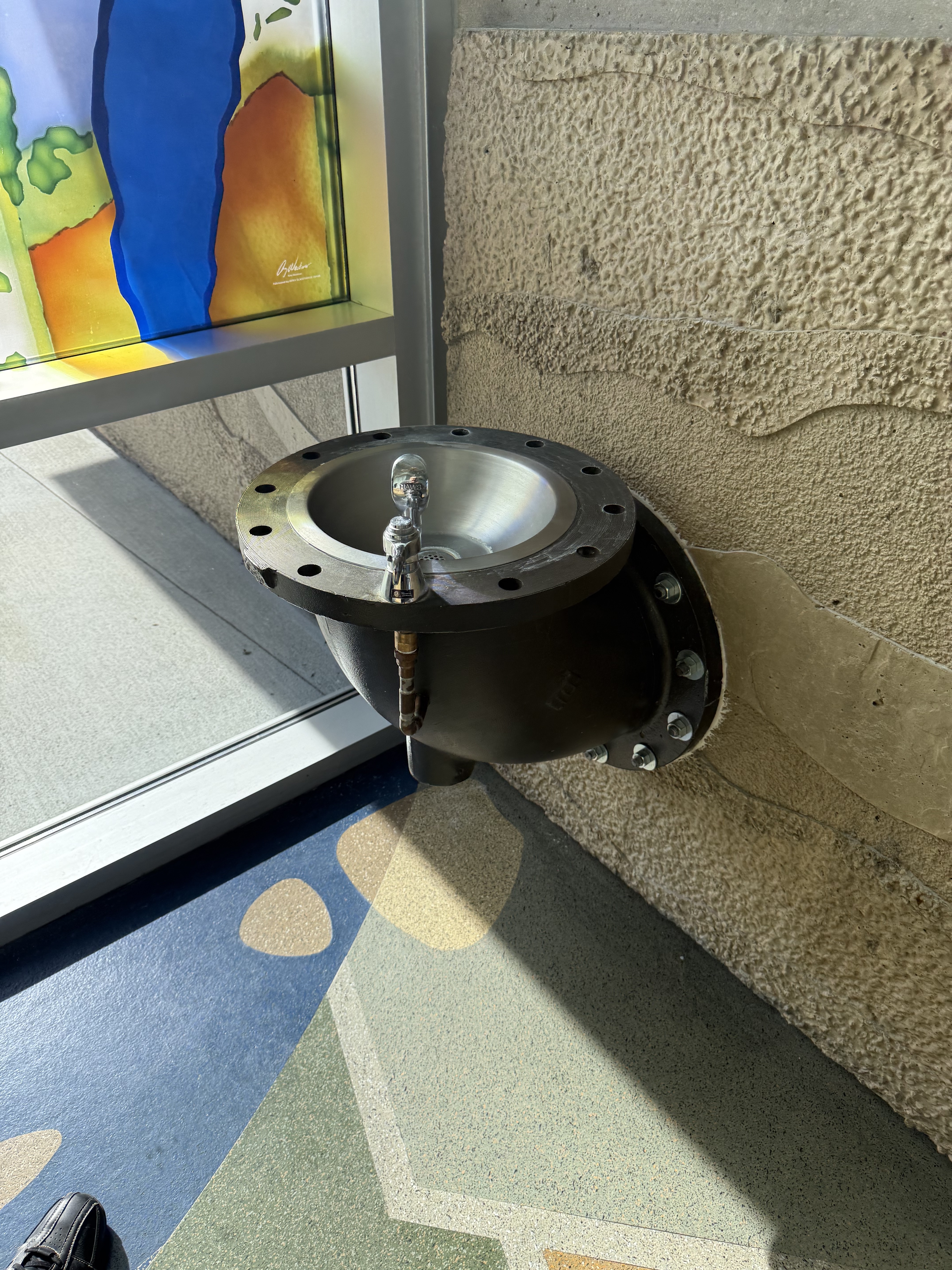 Accessible drinking fountain located in entrance hallway